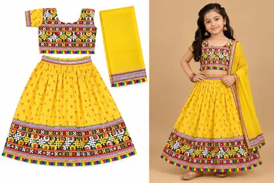 Yellow garba chaniya choli for girls — embroidered choli, printed chaniya and yellow dupatta, shown flat and worn